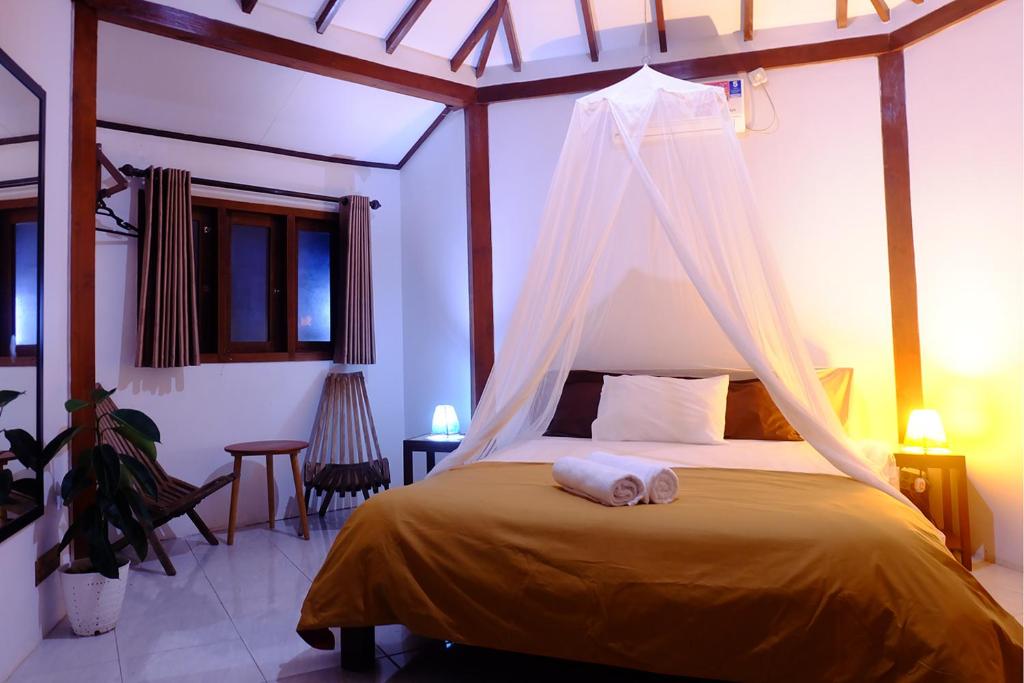 Kamar Deluxe Bungalow 2p di Ayu Hotel & Resort (Pusat Kota)