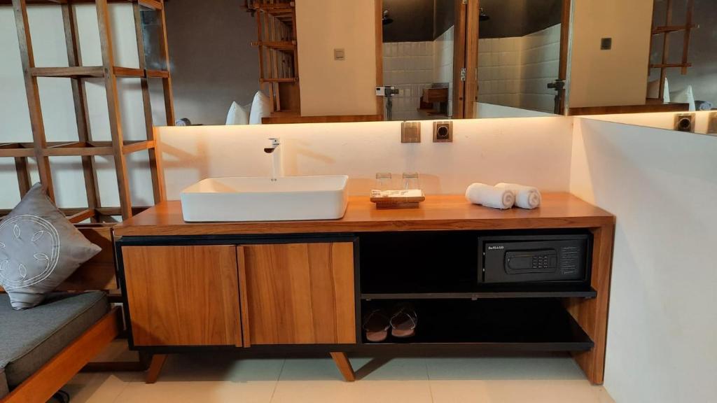 Kamar Signature 3p di Halo Sustainable Hotel & Resort