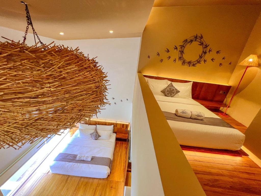 Kamar Grand Deluxe 4p di Halo Sustainable Hotel & Resort