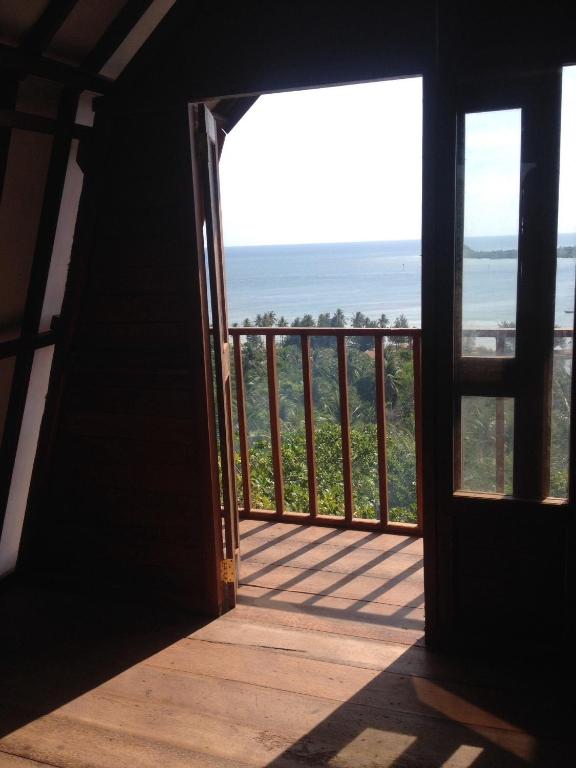Kamar Deluxe Bungalow View Sea 2p di Cocohut Resort (Bukit View Laut)