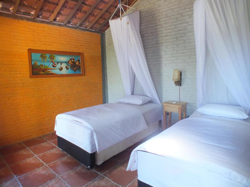 Kamar Superior Twin Bed 2p di Cocohut Resort (Bukit View Laut)