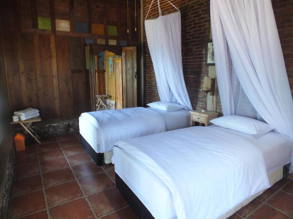 Kamar Economy Twin Bed 2p di Cocohut Resort (Bukit View Laut)